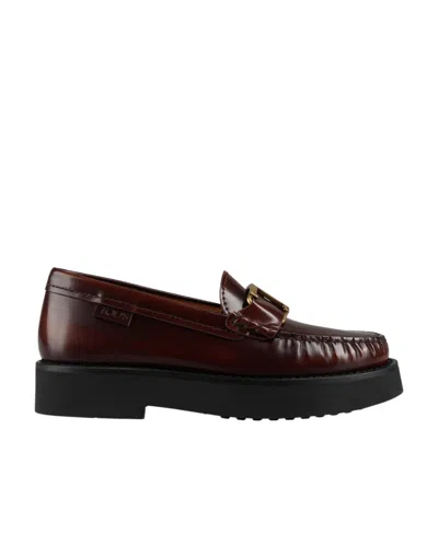 Tod's Logo-buckle Leather Loafers In Black