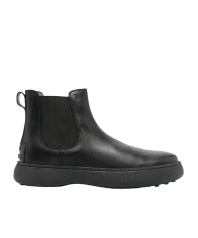 Tod's Logo-debossed Leather Boots In Black