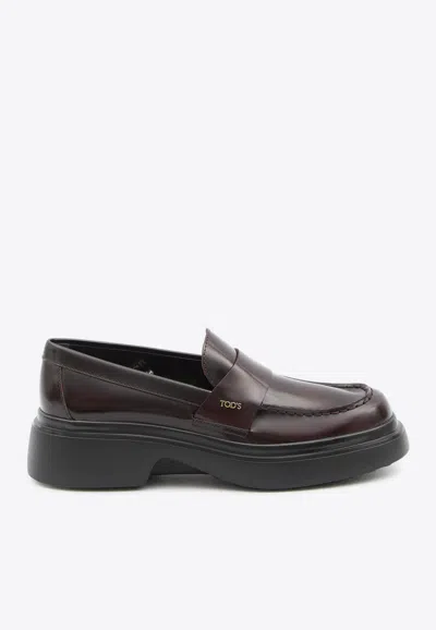 Tod's Logo Plaque Glossy Leather Loafers In Burgundy