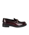 Tod's Logo-plaque Leather Loafers In Black