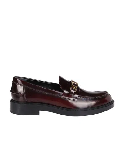 Tod's Logo-plaque Leather Loafers In Black