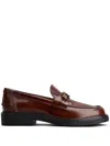 Tod's Moccasin Shoes With Decorative Emblem And Rubber Sole In Brown