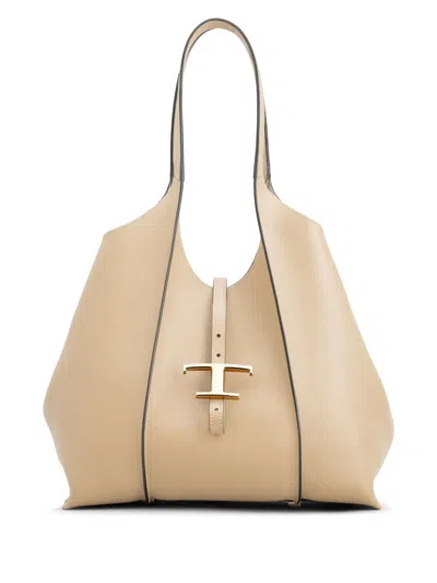 Tod's Luxurious Beige Calfskin Handbag With Logo Pendant In Brown