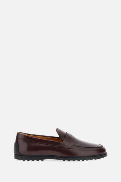 Tod's Monogram-embossed Loafers In Brown