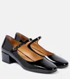Tod's Almond Toe Block Heel Gold Hardware Pumps In Black