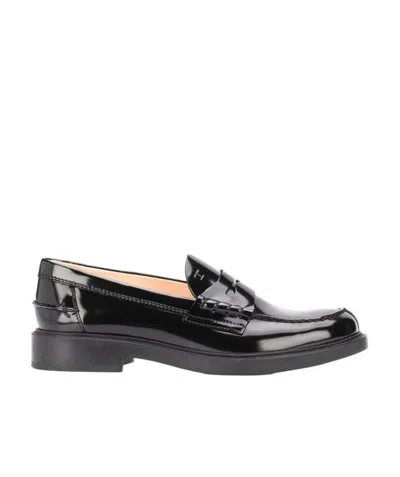 Tod's Patent Penny Loafers In Black