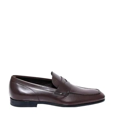 Tod's Penny Loafers In Black