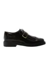 Tod's Loafer With Buckle And Fringe Detailing In Black