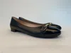 Tod's Round-headed Flat Shoes In Black