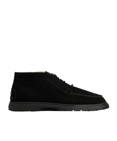 Tod's Round Toe Ankle Boots In Black