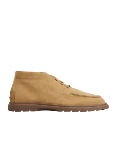Tod's Round Toe Ankle Boots In Brown