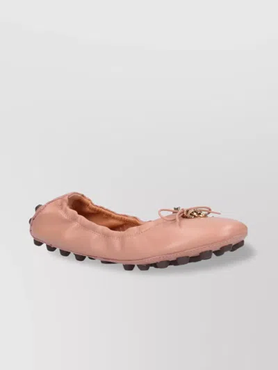 Tod's Round Toe Ballerina Shoes With Bow And Charm Detail In Pink