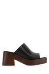 Tod's Platform Mules In Black Leather In B999
