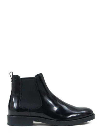 TOD'S STAMPED MONOGRAM ANKLE BOOTS