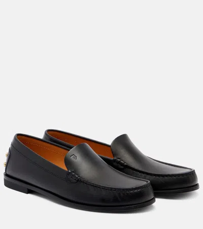 Tod's Black Loafers With Embossed Logo And Stud Details On The Back In Leather Woman