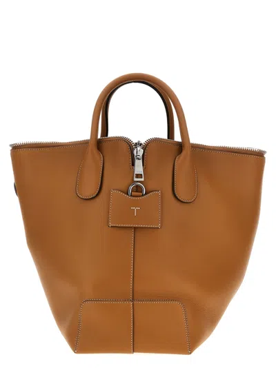 Tod's Swing Hand Bags In Brown