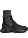 Tod's High Knitted Cuff Sneakers With Textured Upper And Chunky Sole In Black