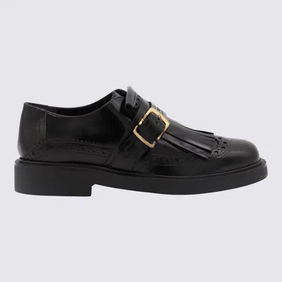 Tod's Black Leather Loafers