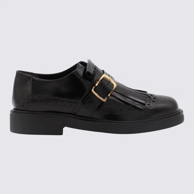 Tod's Black Leather Loafers