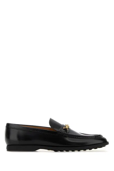 Tod's Calfskin Loafers Mask Detail T Buckle In Black