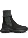 Tod's High Knitted Cuff Sneakers With Textured Upper And Chunky Sole In Black