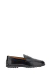 Tod's Calfskin Moccasin With Embossed Monogram And Rubber Gommini Sole In Black