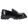 Tod's Chunky Penny Loafers In Black Leather