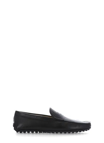 Tod's Flat Shoes In Black