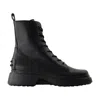 Tod's Chunky Sole Round Toe Ankle Boots With Pull Tab In Black