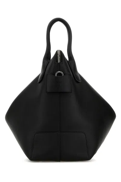 Tod's Handbags. In B999