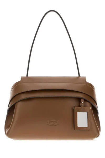 Tod's Handbags. In Brown