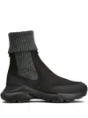 Tod's High Knitted Cuff Sneakers With Textured Upper And Chunky Sole In Black