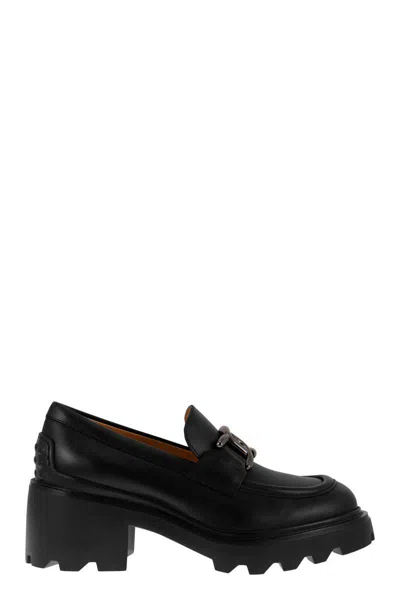 Tod's Elegant Semi-gloss Leather Loafers In Black