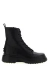 Tod's Chunky Sole Round Toe Ankle Boots With Pull Tab In Black
