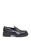 Tod's Fringed Leather Loafers In Black