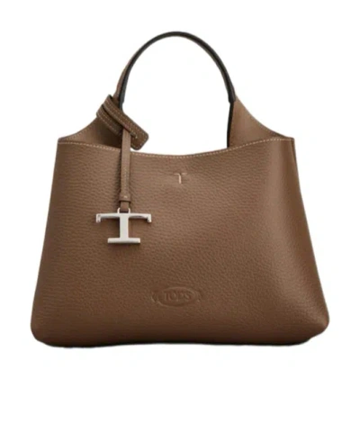 Tod's Logo Embossed Mini Crossbody Bag In Brown