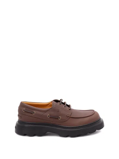 Tod's Leather Boat Shoes In Brown