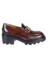 Tod's Moccasin With Gold-tone Buckle And Platform Sole In Gray