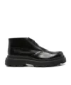 Tod's Round Toe Ankle Boots In Black