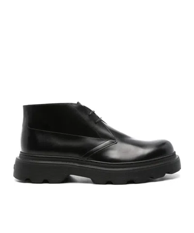 Tod's Round Toe Ankle Boots In Black