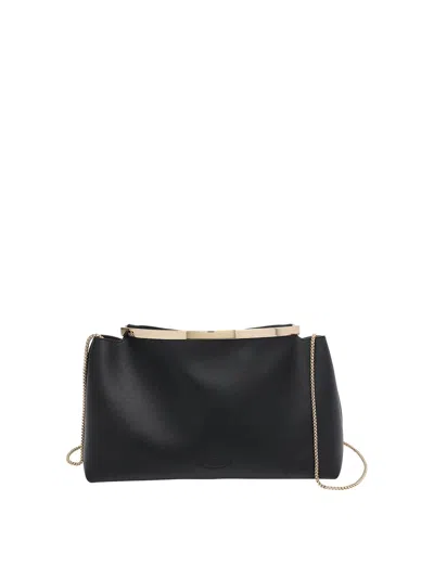 Tod's Tods Magenta Clutch In Black