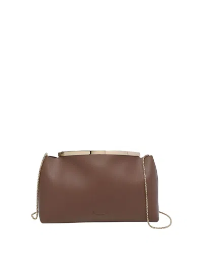 Tod's Tods Magenta Clutch In Brown