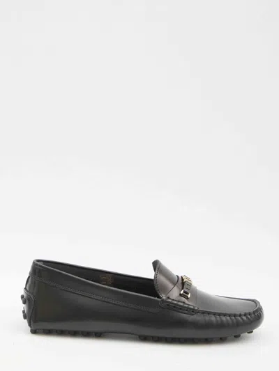 Tod's Logo-plaque Leather Loafers In Black