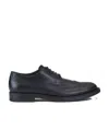 Tod's Wingtip Monogram Brogues In Black