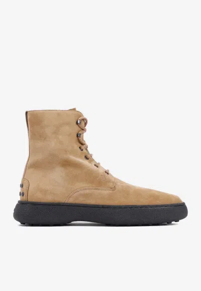 Tod's Winter Gommino Ankle Suede Boots In Brown