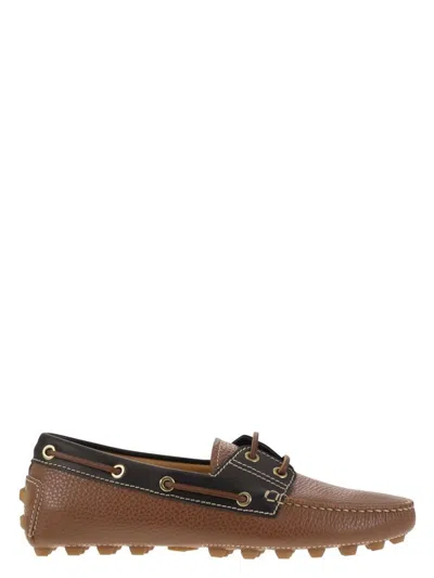TOD'S WOMEN'S LEATHER BOAT BUBBLE GROMMET LOAFER