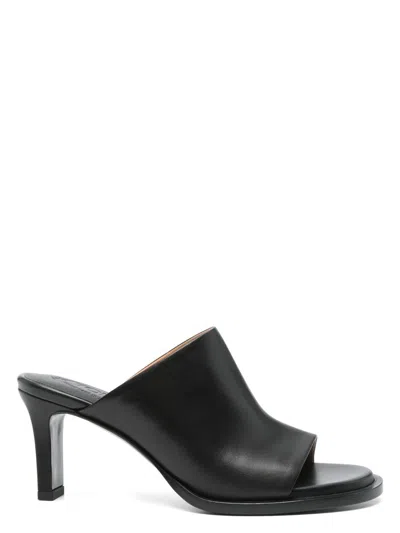 Tod's Mules In Leather In Black