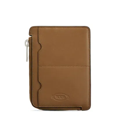 Tod's Zipper Clutch In Brown