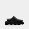Toga Chunky Flat Sandals With Oversized Buckle In Black