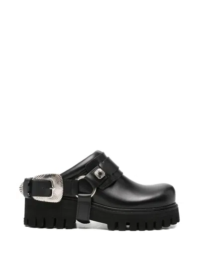 Toga Buckle-detail Lug-sole Mules In Black